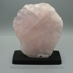 Cuart roz pe suport de lemn